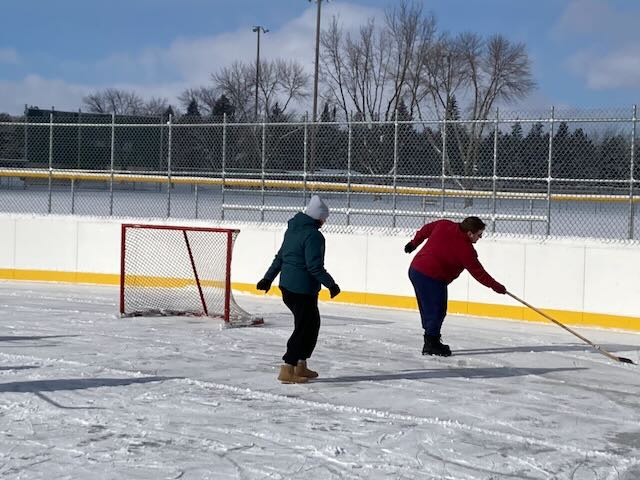 skating next to hockey net goal at memorial park