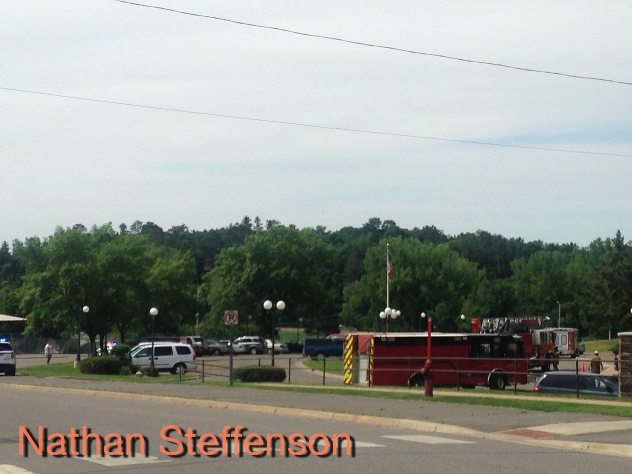 parking lot with fire trucks parking lot with fire trucks