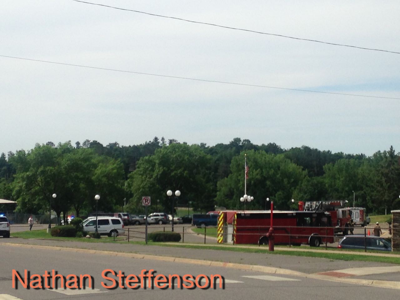 parking lot with fire trucks